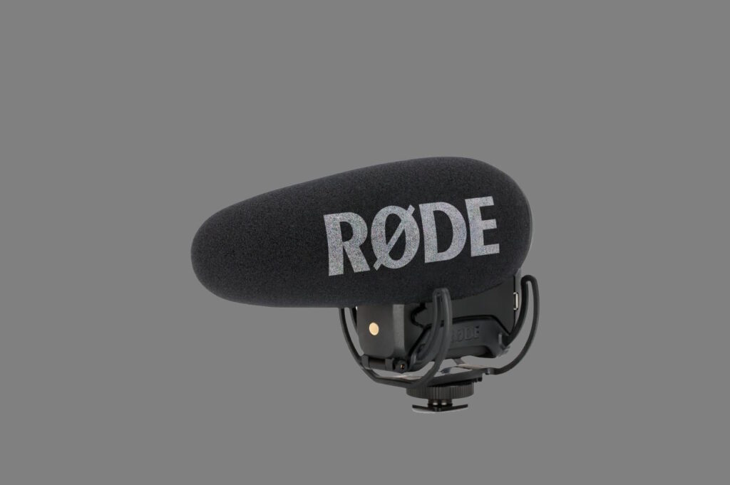 Rode VideoMic Pro+ shotgun microphone with a windscreen, known as a good microphone for YouTube videography with directional audio capture.