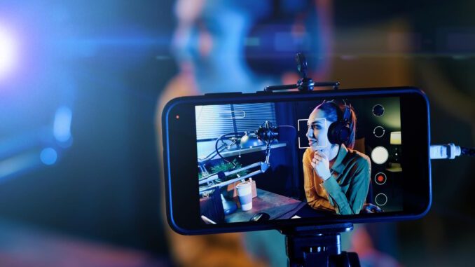 Young woman recording for YouTube